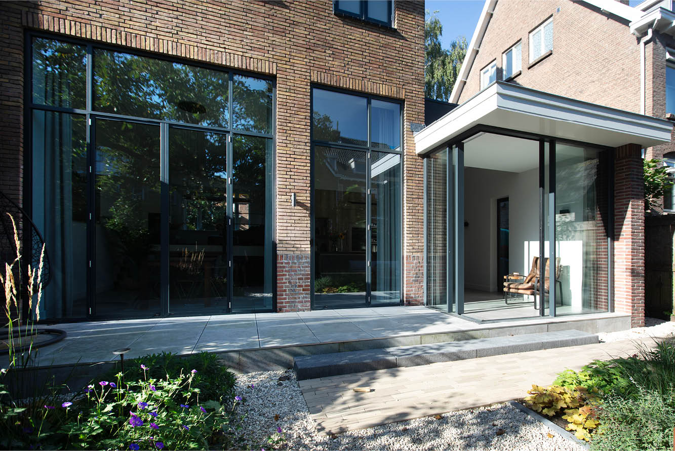 Uitbouw en split-level_schuifpui uitbouw jaren 30 hoekwoning